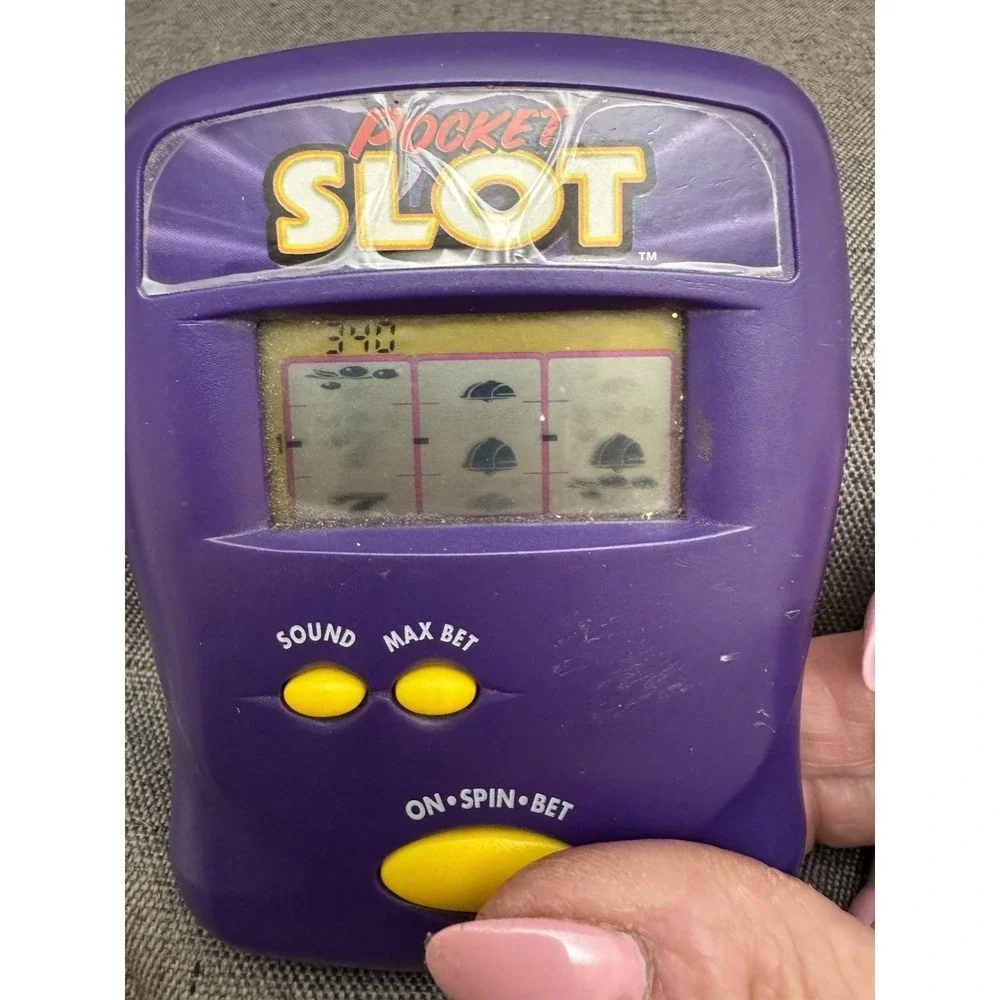 Vintage 1997 Radica Pocket Slot Handheld Electronic Casino Game Purple Tested